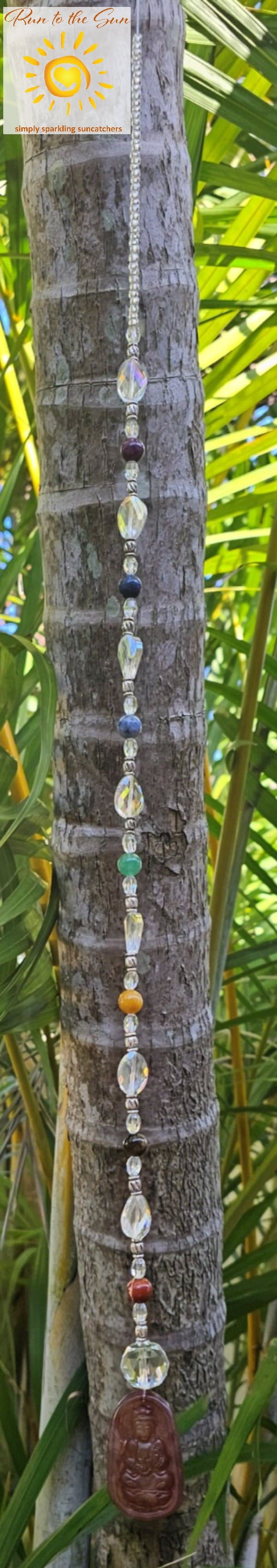 Stone Buddha pendant suncatcher with Chakra beads hanging view