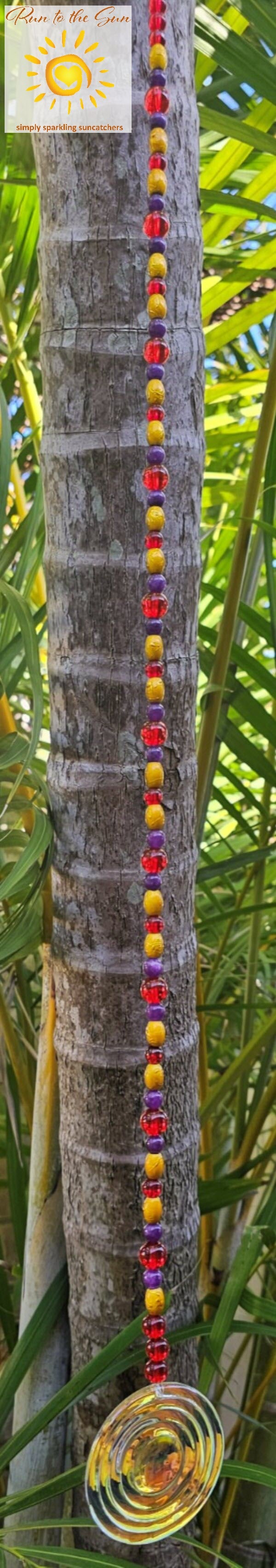 7cm faceted fire-polished glass pendant with Amethyst and red glass and gold beads suncatcher hanging view