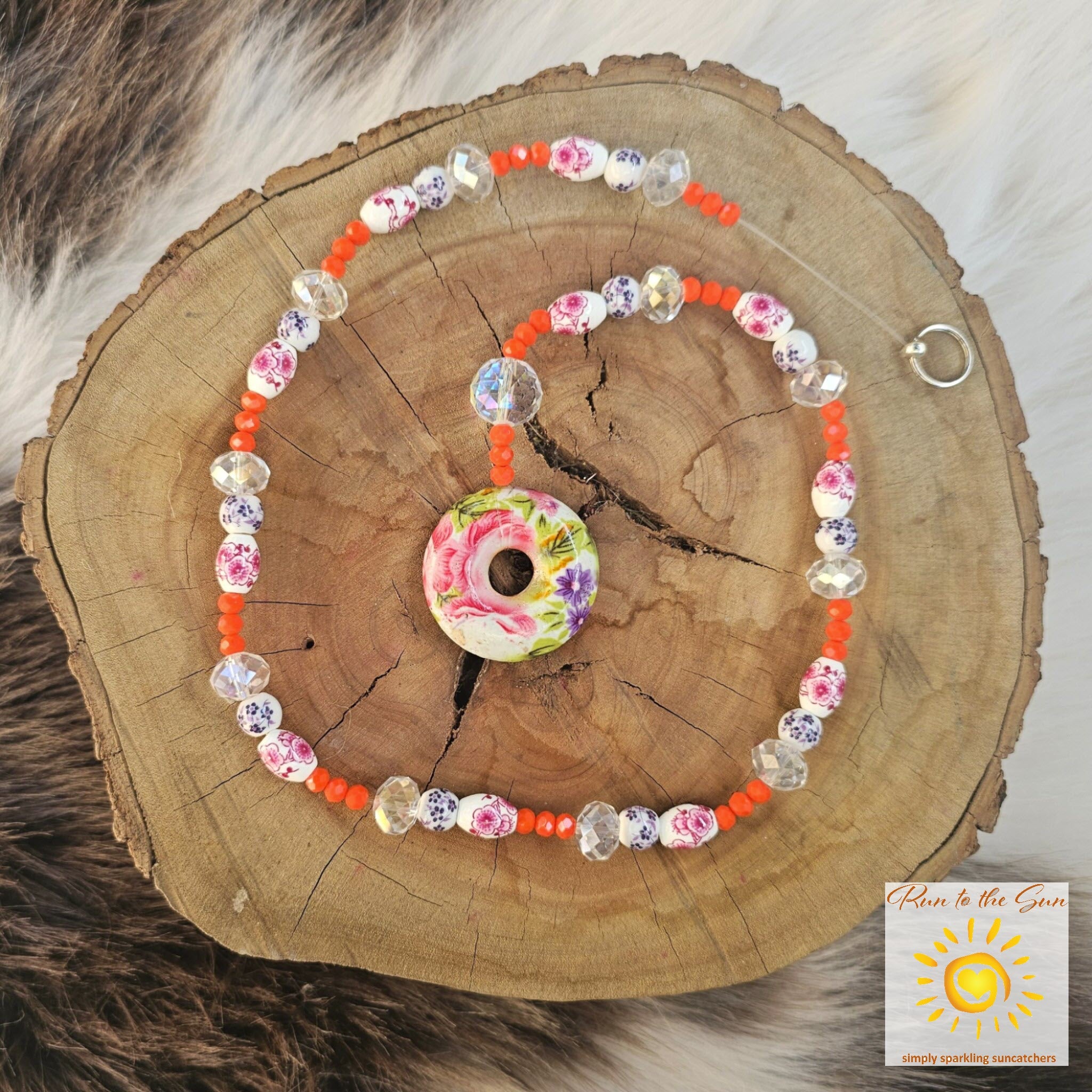 Ceramic donut Pendant Suncatcher with pink, blue and orange beads