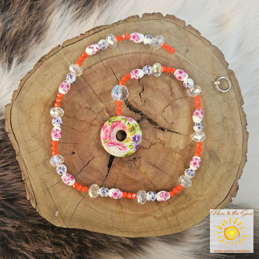 Ceramic donut Pendant Suncatcher with pink, blue and orange beads