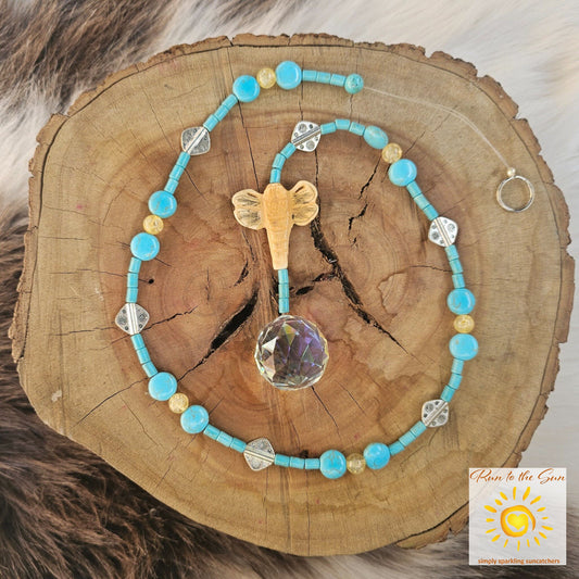 Bone dragonfly pendant with turquoise beads and silver accents