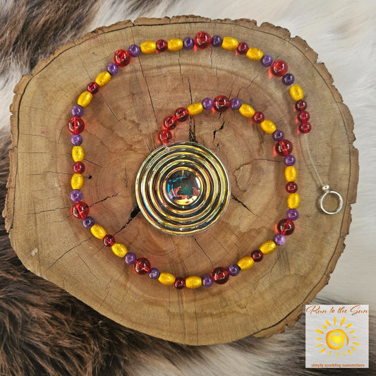7cm faceted fire-polished glass pendant with Amethyst and red glass and gold beads suncatcher