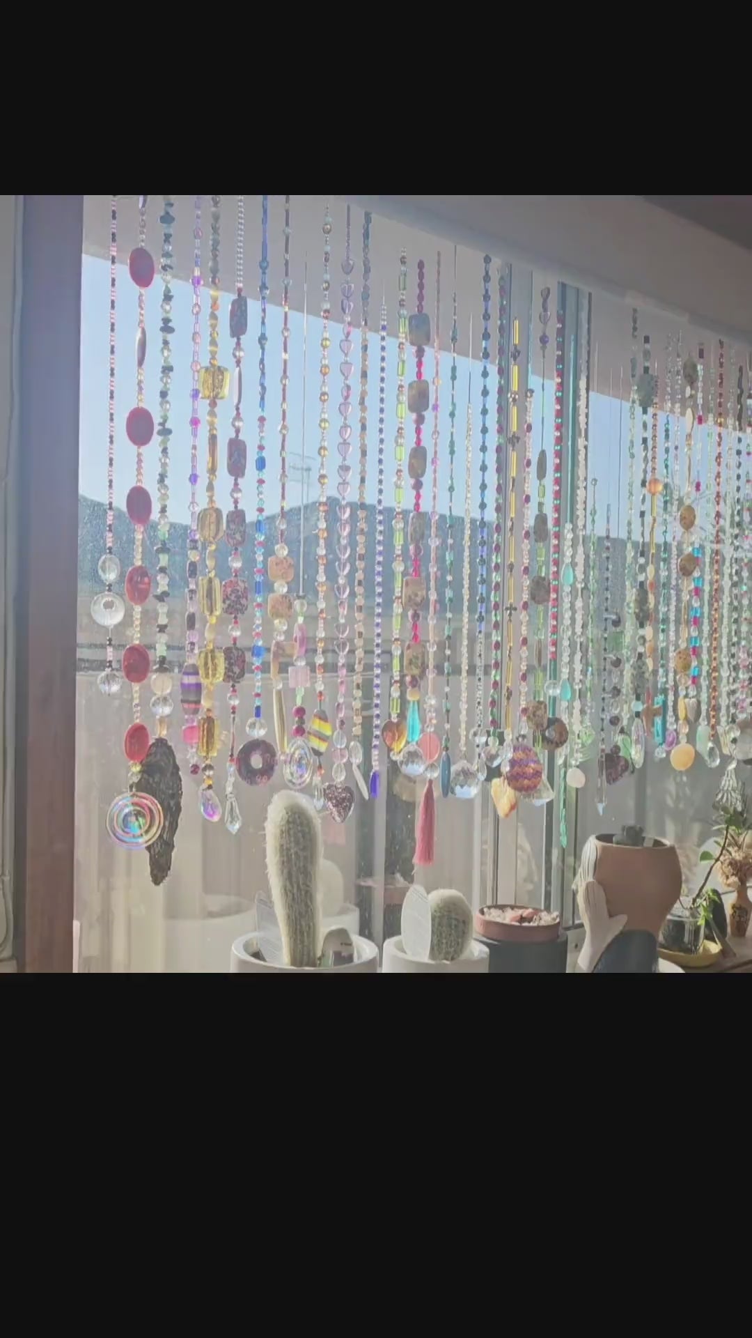 Load video: Kitchen window with 52 suncatchers video